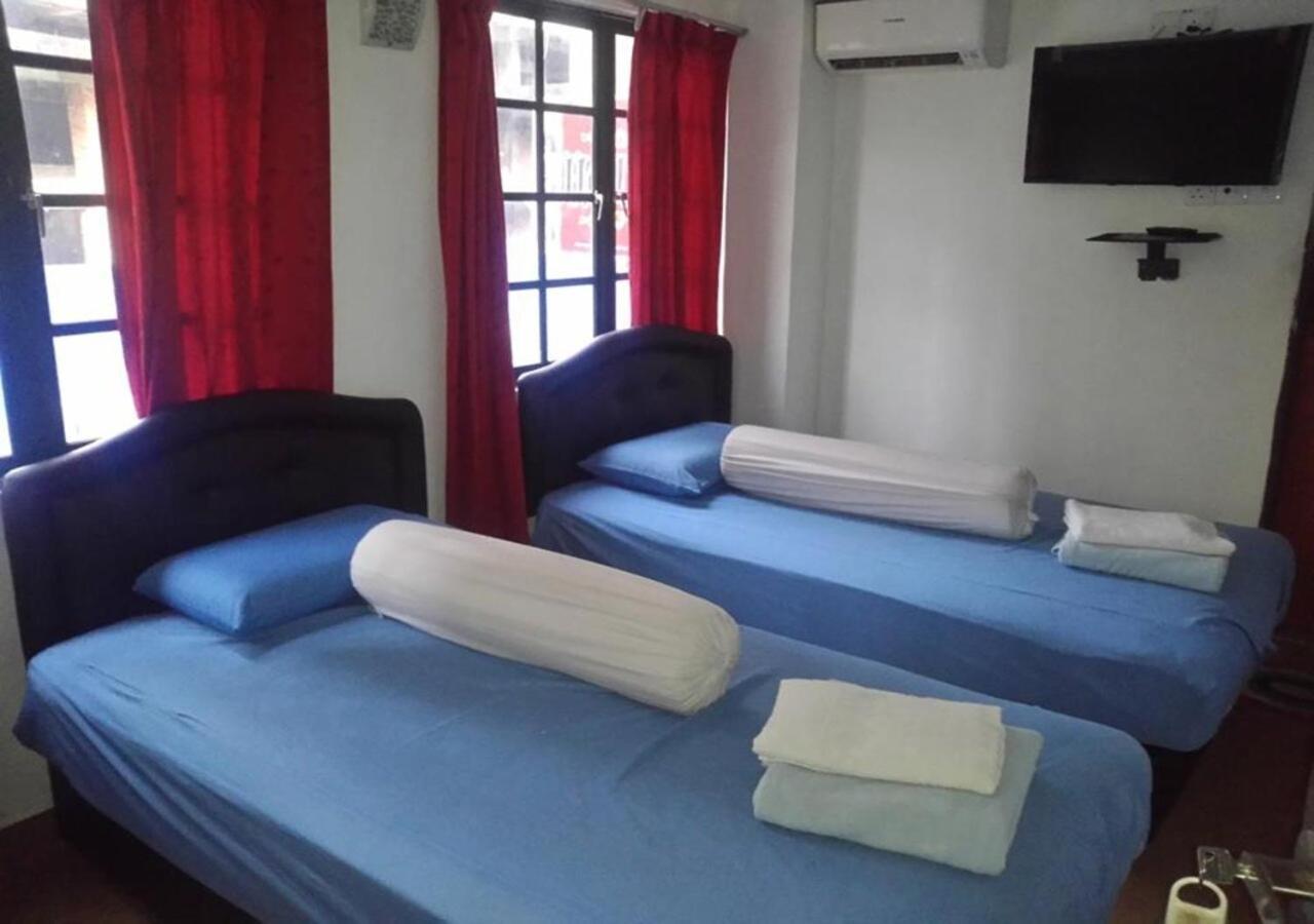 Ash Hotel เซเรมบัน ภายนอก รูปภาพ